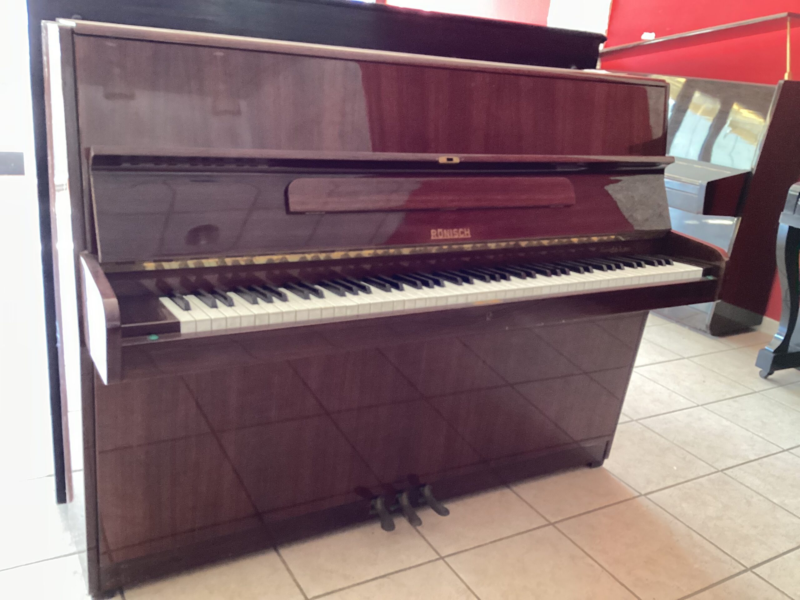 Rönisch Pianoforte verticale usato mogano 3 pedali
