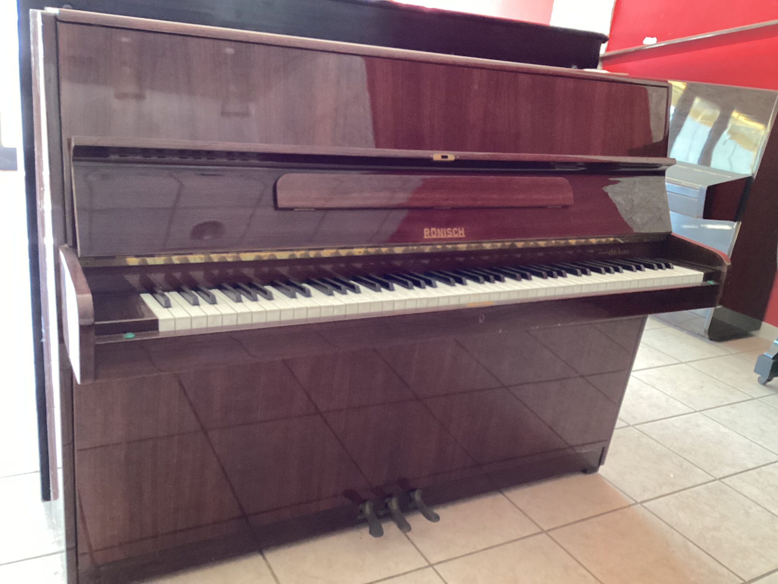 Rönisch Pianoforte verticale usato mogano 3 pedali